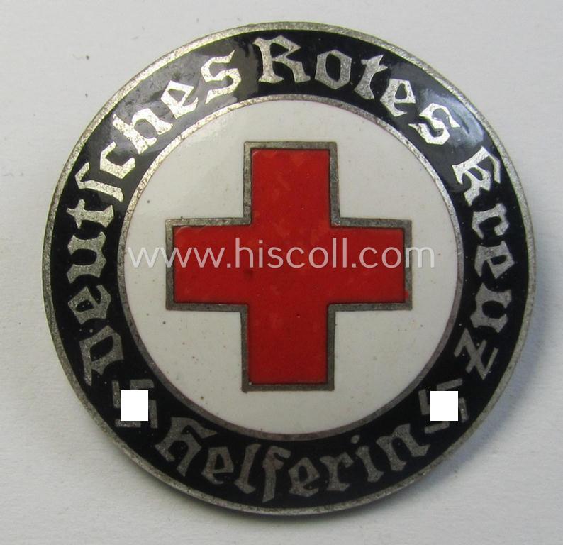 Attractive - and just moderately used! - example of a DRK (ie. 'Deutsches Rotes Kreuz' or German Red Cross) nurses'-badge as was intended for a: 'Helferin' being a non-maker-marked example that comes in a fully untouched condition