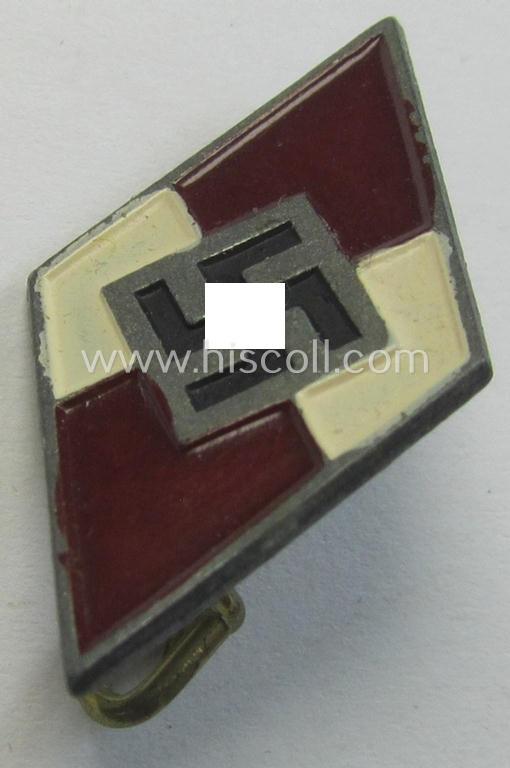 Neat - albeit moderately worn! - HJ (ie. 'Hitlerjugend') lapel-pin (ie.: 'Raute') being a darker-red-coloured and non-enamelled (ie. painted/sprayed) example showing an: 'RzM - M1/34'-makers'-designation