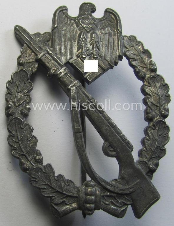 'Infanterie Sturmabzeichen in Silber' (or: silver-class infantry-assault-badge ie. IAB) being a non-maker-marked, so-called: 'solid-back'-example as was (I deem) produced by the: 'Paul Meybauer'-company