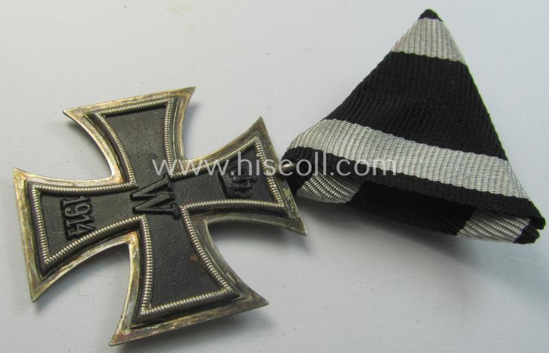 Interesting, WWI-period 'Eisernes Kreuz II. Klasse' being a non-maker-marked example that comes mounted onto its original and (typical!) Austrian-styled, 'trapezoid-shaped' ribbon (ie. 'Bandabschnitt')