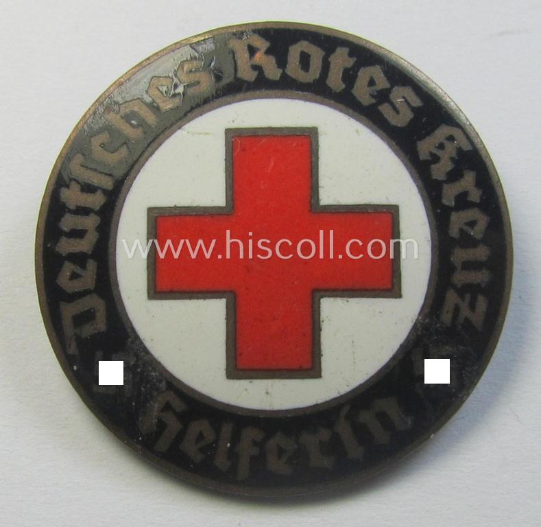 Attractive example of a DRK (ie. 'Deutsches Rotes Kreuz' or German Red Cross) nurses'-badge as was intended for a: 'Helferin' being a maker- (ie. '1'- and/or: 'Ges.Gesch.'-) marked example that comes in an untouched condition