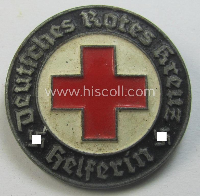 Attractive - and nicely preserved! - typical 'Feinzink'-based, DRK (ie. 'Deutsches Rotes Kreuz' or German Red Cross) nurses'-helpers-badge entitled: 'Helferin' (being an example that shows a: 'Ges.Gesch.'- and/or: 'GB'-designation