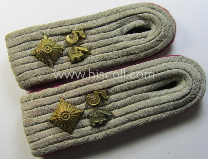 Attractive - and fully matching! - pair of WH (Heeres) 'cyphered', officers'-type shoulderboards as piped in the darker-purple-red- (ie. 'bordeaux-roter'-) coloured branchcolour as was intended for an: 'Oberleutnant des Nebelwerfer-Regiments 54'