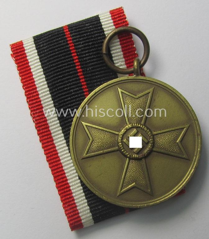 Neat, 'Kriegsverdienstmedaille 1939' being a non-maker-marked- (and/or: typical 'Buntmetall'-based) specimen that came together with its full-length (and bright-red-coloured!) ribbon (ie. 'Bandabschnitt')