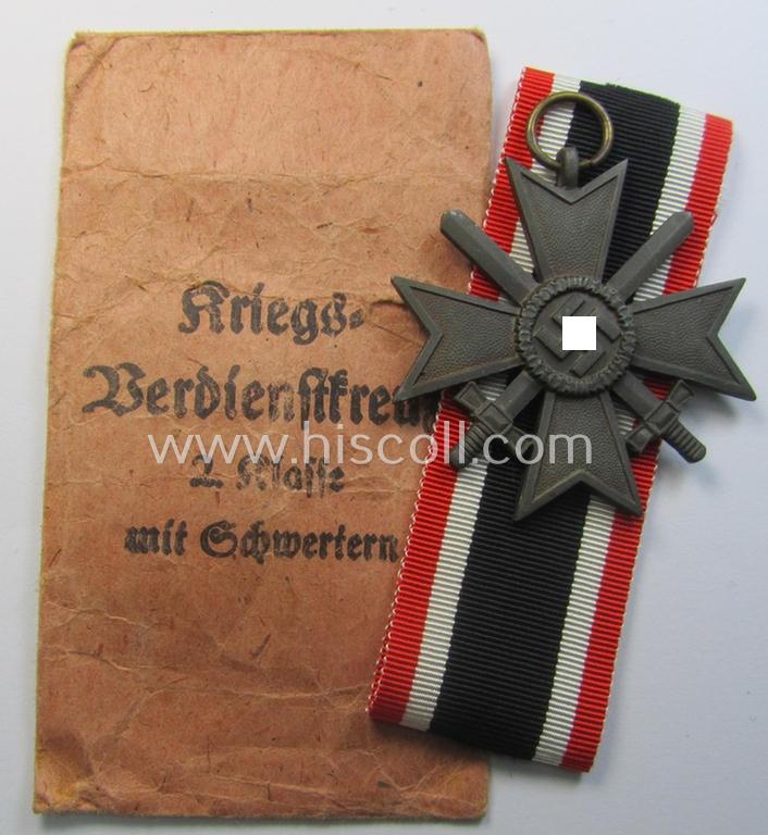 Superb medal-set: 'KvK 2. Klasse mit Schwertern' being a maker- (ie. '45'-) marked specimen by the maker- (ie. 'Hersteller') named: 'Franz Jungwirth' and that comes packed in its original, 'Zellstoff'-based pouch of issue