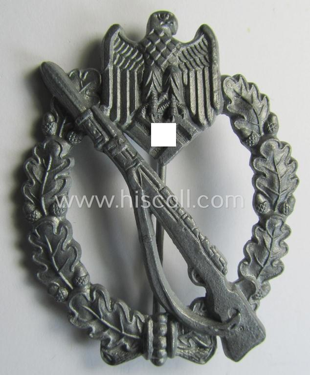 Attractive - and mininally used! - 'Infanterie-Sturmabzeichen in Silber' (or: silver-class infantry-assault badge ie. IAB) being a neatly maker- (ie. '4'- or: 'Metall u. Kunststoff'-) marked example as executed in silverish-coloured 'Feinzink'