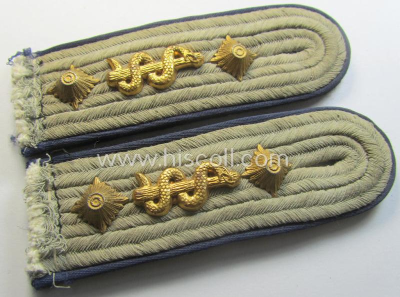 Superb - and fully matching! - pair of Waffen-SS officers'-type shoulderstraps as piped in the darker-blue-coloured branchcolour as intended for usage by an: 'SS-Hauptsturmführer o. Arzt' who served within the: 'Waffen-SS Sanitäts-Truppen'