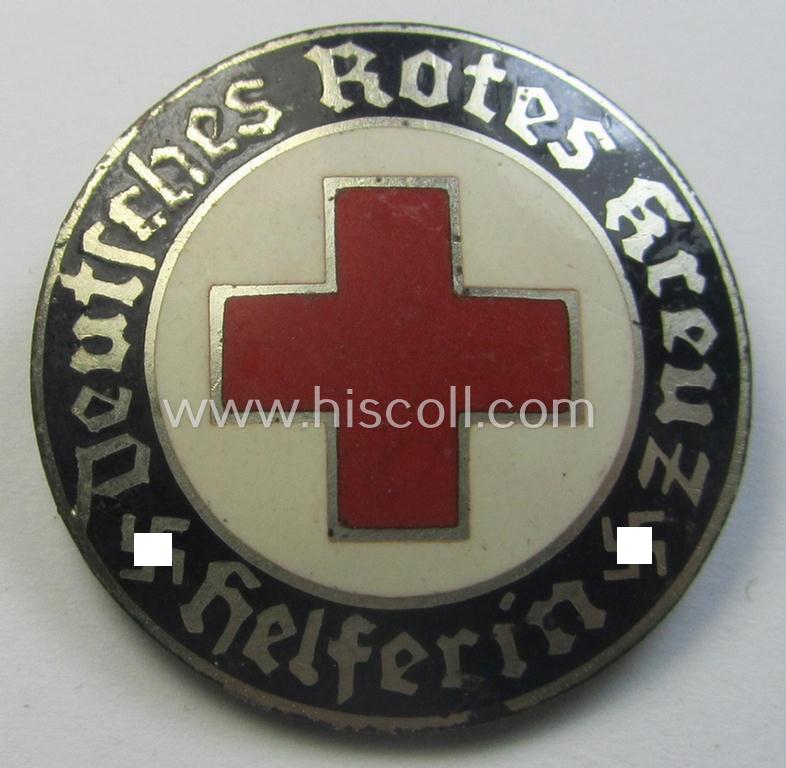 Attractive - and just moderately used! - example of a DRK (ie. 'Deutsches Rotes Kreuz' or German Red Cross) nurses'-badge as was intended for a: 'Helferin' being a maker- (ie. 'ELM'-) marked example that comes in a fully untouched condition