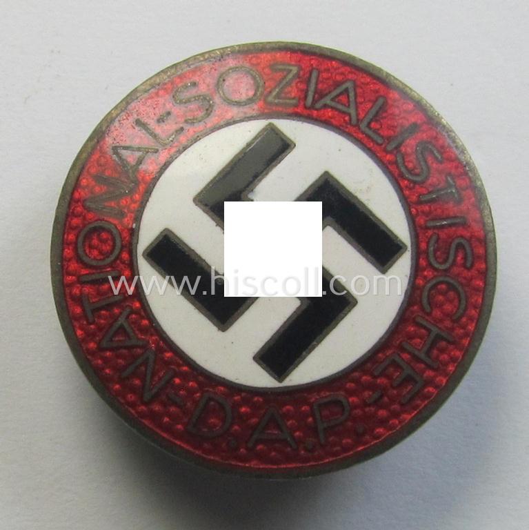 Neatly enamelled- (and bright-red-coloured!) 'N.S.D.A.P.'-membership-pin- ie. party-badge (or: 'Parteiabzeichen') which is nicely maker-marked on the back with the makers'-designation: 'RzM' and/or: 'M1/72'