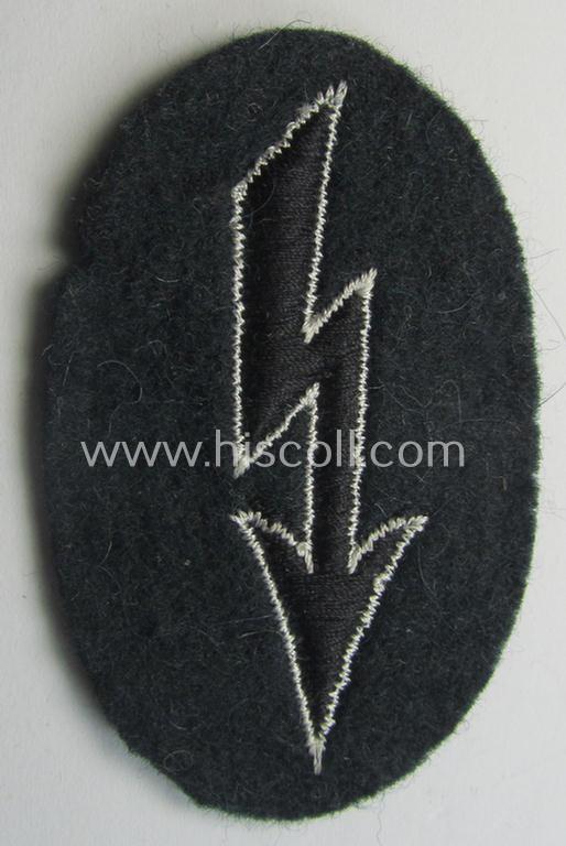 WH (Heeres) trade- and/or special-career-insignia ie. machine-embroidered 'signal-blitz' as executed in black-coloured (and white-piped) linnen on darker-green background as was specifically intended for a soldier within the: 'Pionier-Truppen'