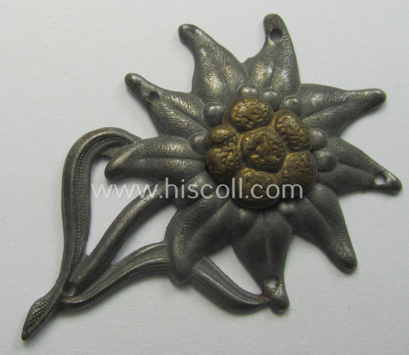 WH (Heeres) silver-greyish-coloured and zinc-based (and neatly maker- ie. 'G.B. 44'- marked!) so-called: M43-cap-badge (ie. 'Mützenabzeichen') depicting an: 'Edelweiss'-flower as was used by the various 'Gebirgsjäger'-related divisional-staff