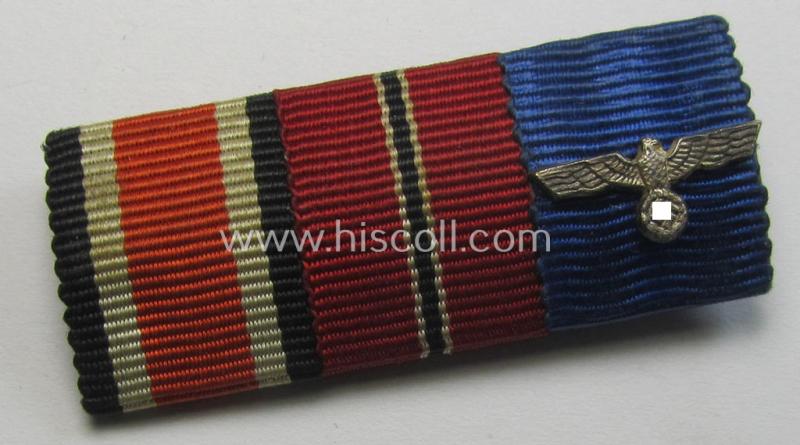 Neat, 3-pieced, WH (Heeres etc.) medal-bar (ie. 'Feld- o. Bandspange') showing resp. the ribbons for an: 'Eisernes Kreuz II. Klasse' (or: iron cross second class), an: 'Ost'-medal and a: WH 'Dienstauszeichnung der 4. Stufe'