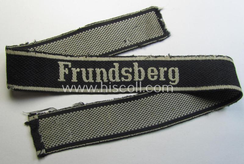 Stunning - and truly worn! - Waffen-SS 1943/44 pattern cuff-title (ie. 'Ärmelstreifen') depicting the machine-woven Latin script text in silver-grey-coloured linnen as was  intended for a member within the: 10. SS-Panzer-Division 'Frundsberg'