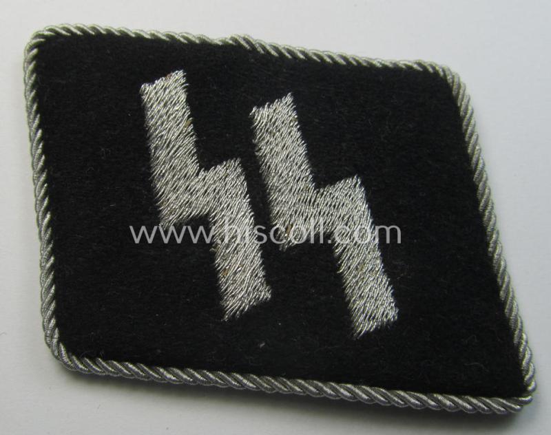 Superb - rarely encountered and neatly (semi) 'flat-wire'-woven! - 'Waffen-SS' officers'-pattern 'runes'-collar-tab (ie. 'Kragenspiegel für Führer der Waffen-SS') that comes in a never used- ie. non-worn-, condition