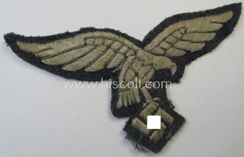 Interesting, 'Extra Qualität', WH (LW) EM/NCO- (evt. officers'-) type, hand-embroidered breast-eagle (ie. 'Brustadler für Mannschaften u. Uffz. der LW') being a so-called: 'down-tailed'-example that comes in a carefully tunic-removed, condition