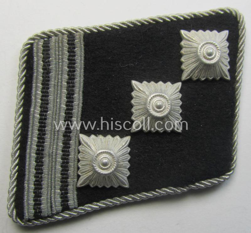 Superb, Waffen-SS (ie. 'SS') officers'-pattern rank collar-tab ('Kragenspiegel für Führer') being a 'standard-issue'- (ie. 'RzM'-) pattern example as executed in the black-coloured wool as was intended for an: 'SS-Hauptsturmführer'