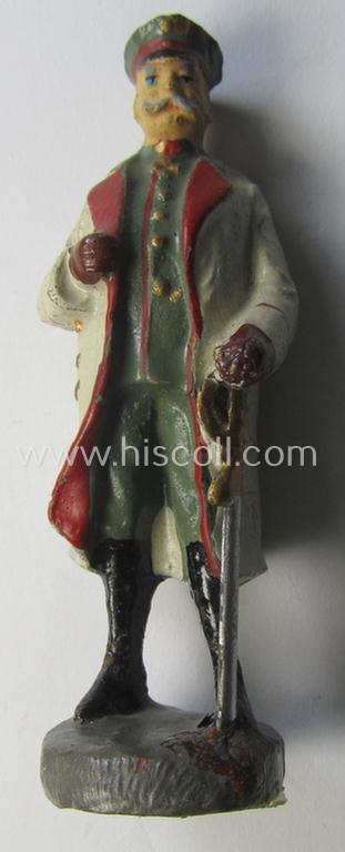 Attractive - typically hand-painted and actually not that easily found! - TR-period, 'Elastolin'-figure depicting the WWI-era 'Feldmarschall' von Hindenburg wearing his field-grey-coloured great-coat and visor-cap