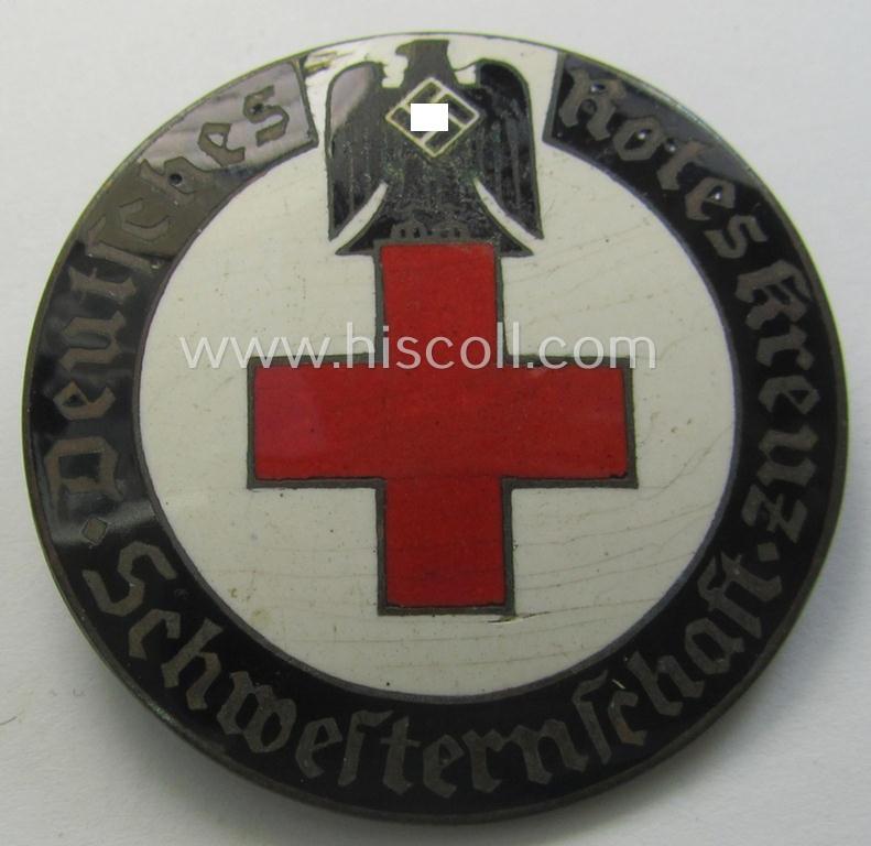 Attractive, DRK (ie. 'Deutsches Rotes Kreuz') so-called: nurses'-badge entitled: 'Schwesternschaft' being a desirable, larger-sized version showing an engraved bearers'-number: ('426') and towns'-name: ('Karlsruhe')