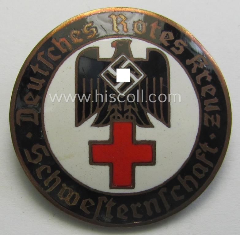 Superb, DRK (ie. 'Deutsches Rotes Kreuz') so-called: nurses'-badge entitled: 'Schwesternschaft' being a medium-sized version showing an engraved bearers'-number: ('423'), town: ('Karlsruhe') and/or makers'-mark ('A. Stübbe - Berlin')