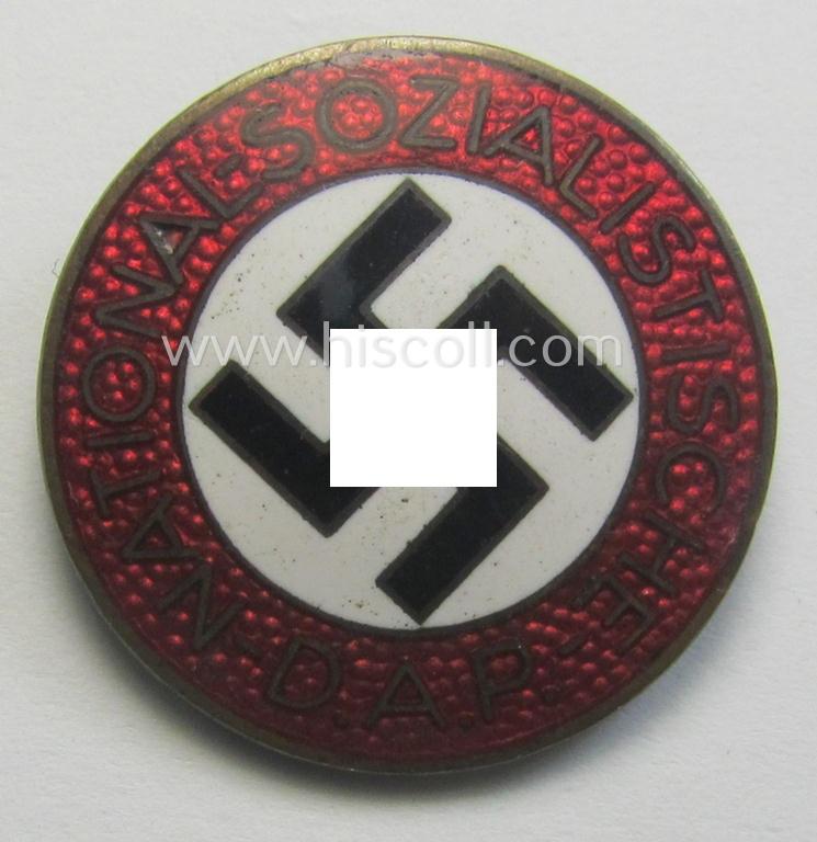 Neat - bright-red-coloured and nicely preserved! - 'N.S.D.A.P.'-membership-pin- ie. party-badge (or: 'Parteiabzeichen') which is maker-marked on its back with the makers'-designation: 'RzM' and/or: 'M1/72'