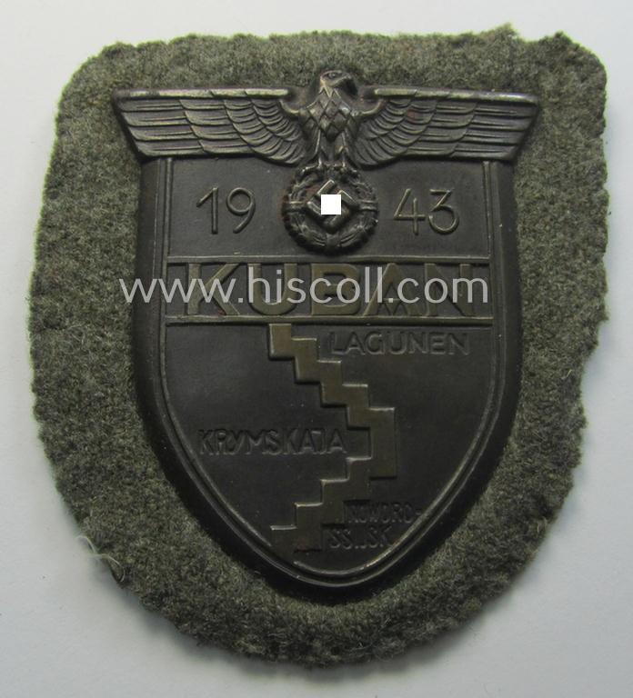 Very attractive - and actually scarcely encountered! - WH (Heeres ie. Waffen-SS) 'Kuban'-campaign-shield that comes mounted onto its original field-grey-coloured- and/or woolen-based 'backing' as issued and/or used