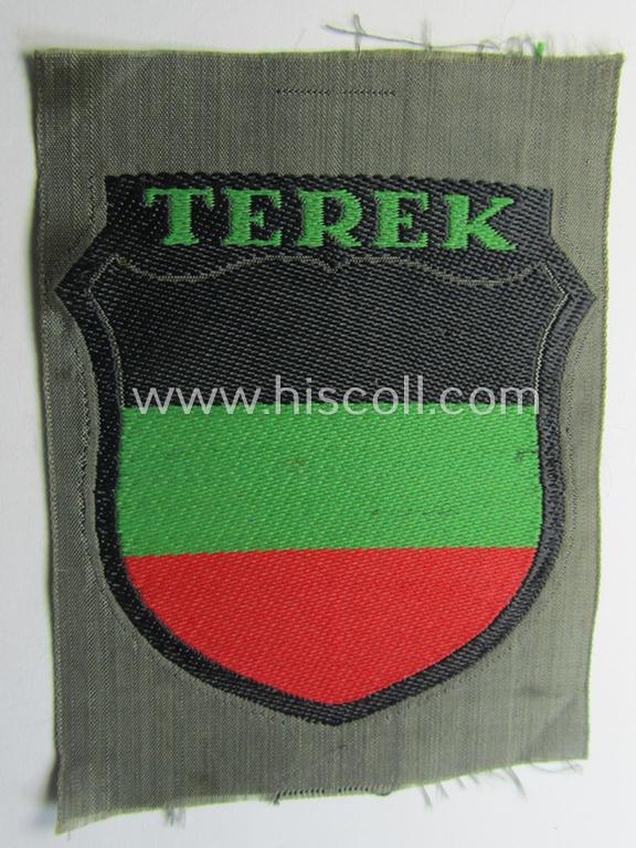 Superb, 'BeVo'-type armshield (of the second pattern) entitled: 'Terek' being a piece as was intended for a volunteer who served within the 'Deutsche Wehrmacht' ie. within the 'Terek-Kosakken'