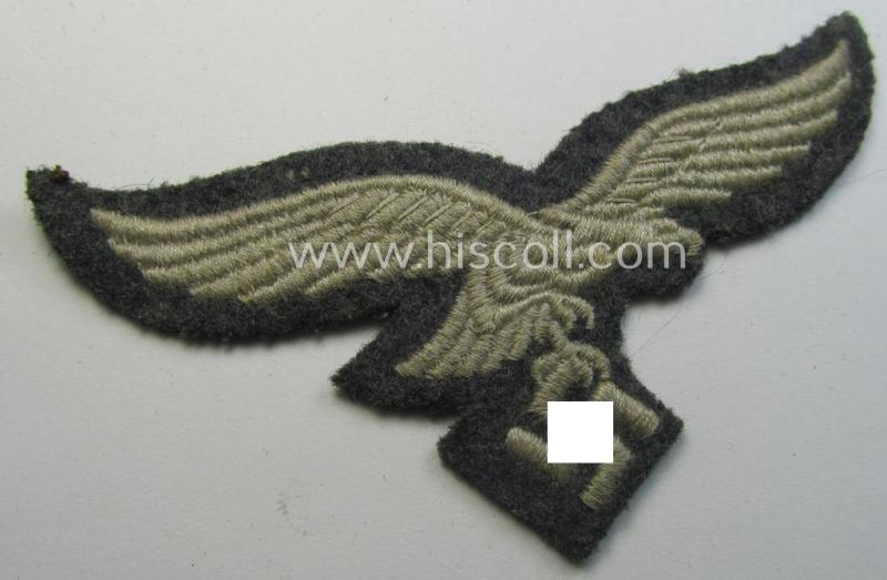 Attractive - and clearly used- ie. carefully tunic-removed! - WH (Luftwaffe) EM- (ie. eventually NCO-) type breasteagle (being a once tunic-attached example as executed in typical machine-embroidered-pattern)