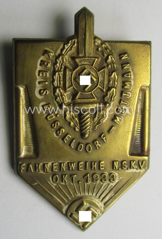 Neat, N.S.K.V.- (ie. 'Nationalsozialistischer Kriegsopferversorsung'-) related 'tinnie' being a non-maker-marked example showing the N.S.K.V.-logo, sunburst and text that reads: 'Fahnenweihe N.S.K.V. - Okt. 1933'