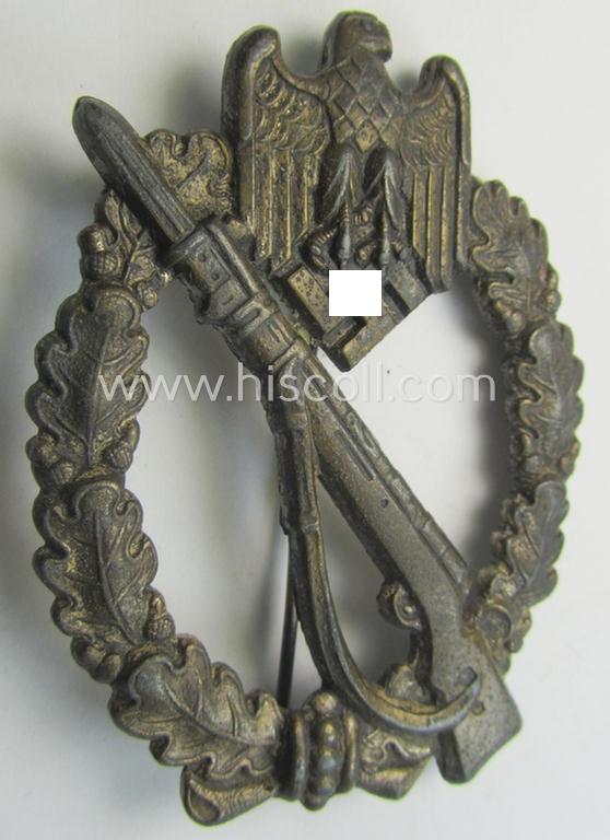 Attractive, 'solid-back' 'Infanterie Sturmabzeichen in Silber' (or: silver infantry-assault badge ie. IAB) being a non-maker-marked example as executed in zinc-based metal (ie. 'Feinzink') as was produced by the: 'Wilh. Deumer'-company