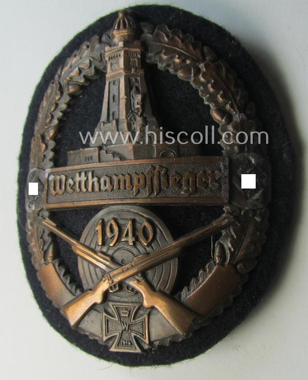 Attractive, bronze-toned (and I deem 'Cupal'-based!) 'Kyfhäuserbund Schiessauszeichnung' depicting the 'Kyfhäuser'-monument and double 'swastika'-devices and bearing the text that reads: 'Wettkampfsieger 1940'