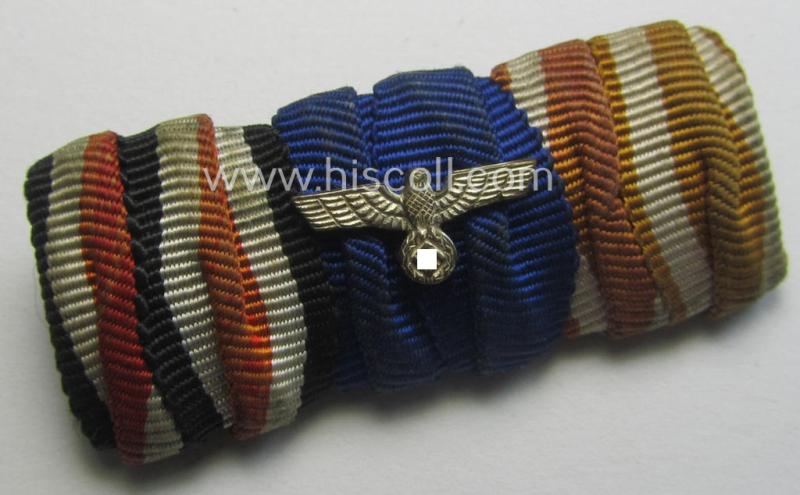 Attractive, 3-pieced, WWII-period ribbon-bar (ie. 'Feld- o. Bandspange') showing the ribbons for an: 'EK II.Kl.', a: WH 'Dienstauszeichnung der 4. Stufe' and a 'Westwall'-medal