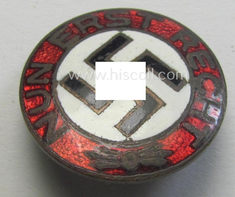 Neatly enamelled- (and bright-red-coloured!) I deem early-period so-called: 'N.S.D.A.P.'-supporters'-badge (sized like a 'Parteiabzeichen' and showing the text: 'Nun erst Recht!') that comes in a wonderful condition