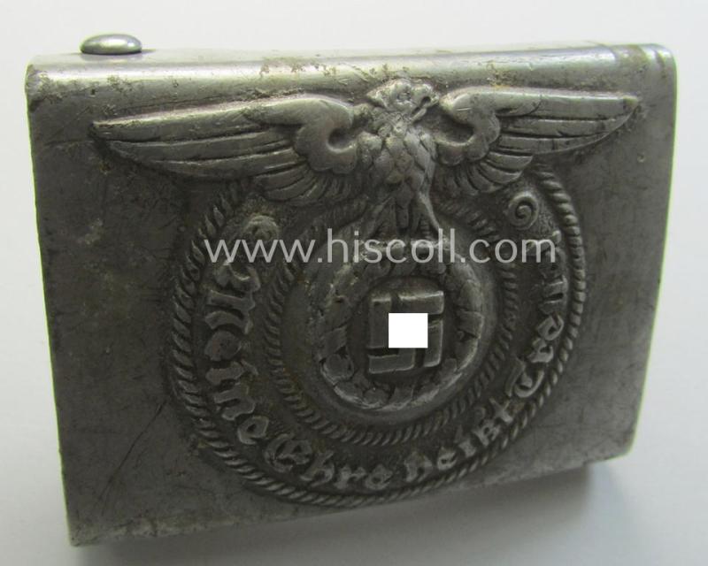 Superb, SS- (ie. Waffen-SS), aluminium-based, enlisted-mens'- (ie. NCO-) pattern belt-buckle being a neatly maker- (ie. 'RzM - 36/39 SS'-) marked example that comes in a moderately used- and/or worn, condition