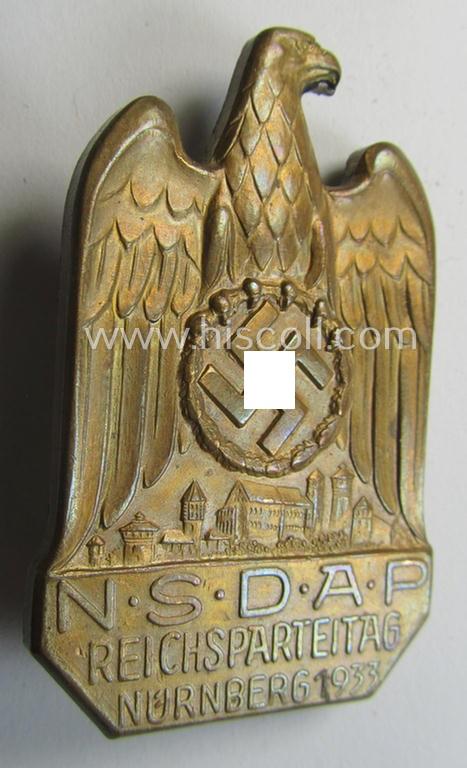 Attractive, N.S.D.A.P.-related 'tinnie' (ie. 'Tagungs- o. Veranstaltungsabzeichen'-) being a (typical) non-maker-marked- and/or golden-bronze-toned example showing the text: 'N.S.D.A.P. Reichsparteitag - Nürnberg 1933'