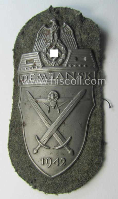 Superb example of a - scarcely encountered! - WH (Heeres ie. Waffen-SS) 'Demjansk'-campaign-shield (of the 'missing-log'-pattern!) as executed in magnetic metal (ie. so-called: 'Eisenblech') and that comes in an overall very nice-, condition