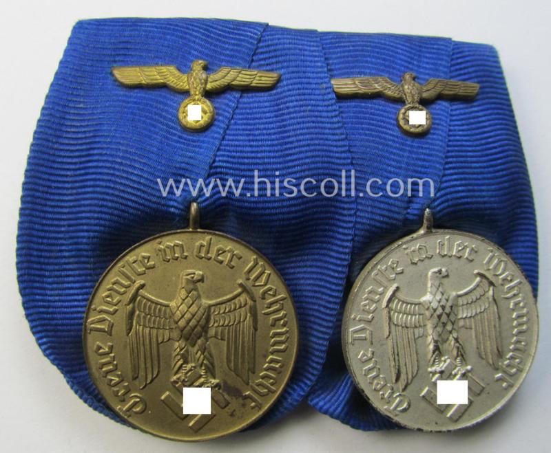 Attractive - and minimally used! - two-pieced medal-bar (ie. 'Spange') showing two: WH (Heeres o. Kriegsmarine) so-called: 'Dienstauszeichnungen für 4 u. 12 Jahre Treue Dienste' that both come period-mounted as a so-called: 'Doppelspange'