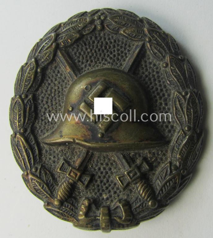 Attractive, early-pattern black-class wound-badge (ie.: 'Verwundeten Abzeichen in Schwarz') being a detailed so-called: 'Spanish Civil-War'-version that comes in a truly used- and/or worn, condition