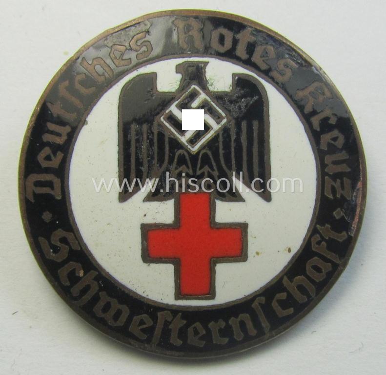 Attractive, DRK (ie. 'Deutsches Rotes Kreuz') so-called: nurses'-badge entitled: 'Schwesternschaft' being a medium-sized version showing an engraved bearers'-number: ('738'), town: ('Karlsruhe') and/or makers'-mark ('A. Stübbe - Berlin')