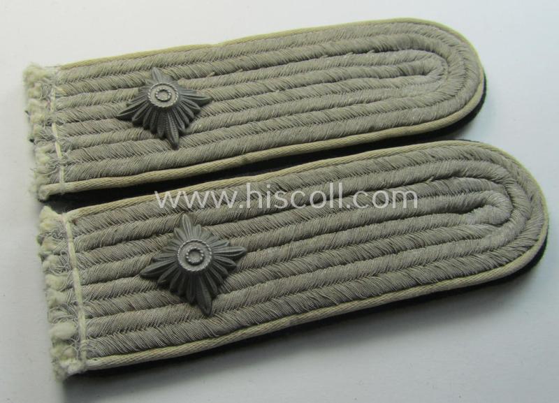 Superb - and fully matching! - pair of Waffen-SS officers'-pattern shoulderboards as piped in the white-coloured branchcolour as was intended for usage by an: 'SS-Obersturmführer' who served with the 'SS-Infanterie-Truppen'