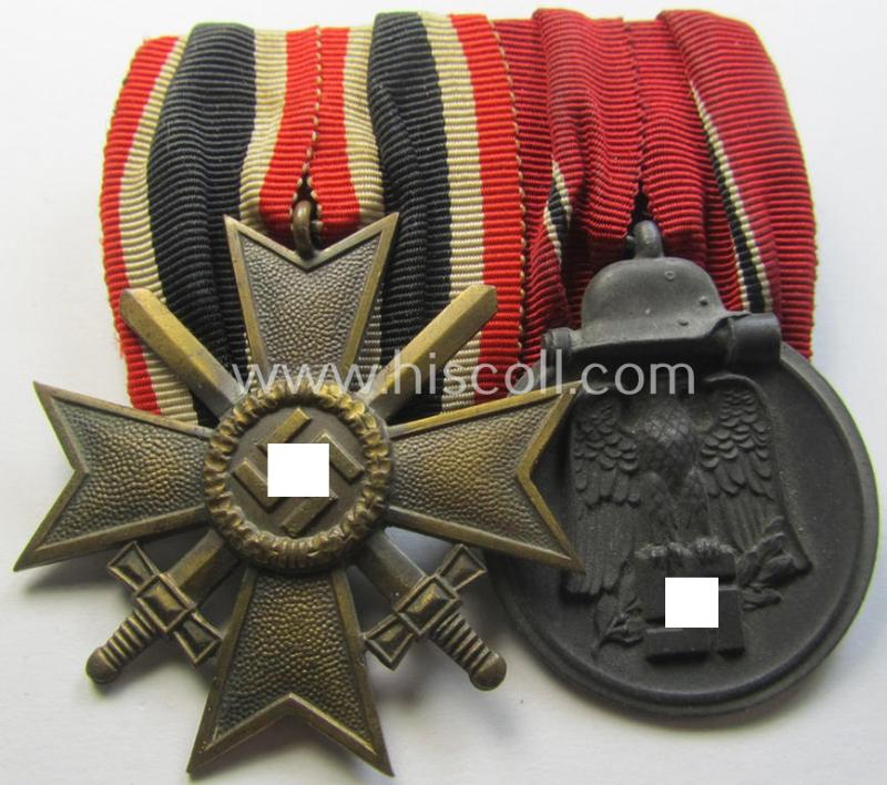 Attractive - and desirable! - two-pieced medal-bar (ie. 'Orden- o. Doppelspange') showing a: 'KvK II.Kl. mit Schwertern' and a: 'Medaille Winterschlacht im Osten 1941-42' that both come period-mounted as a: 'Doppelspange'