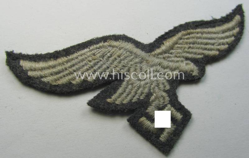 Attractive - and clearly used- ie. carefully tunic-removed! - WH (Luftwaffe) EM- (ie. eventually NCO-) type breasteagle (being a once tunic-attached example as executed in typical machine-embroidered-pattern)