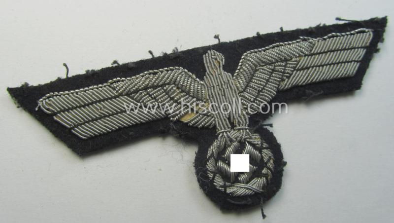 Attractive - and truly scarcely seen! - WH (Kriegsmarine) neatly hand-embroidered, officers'-type breasteagle on a darker-blue background as was specifically intended for the various naval administrative-officials (ie. 'Beambten der Kriegsmarine')