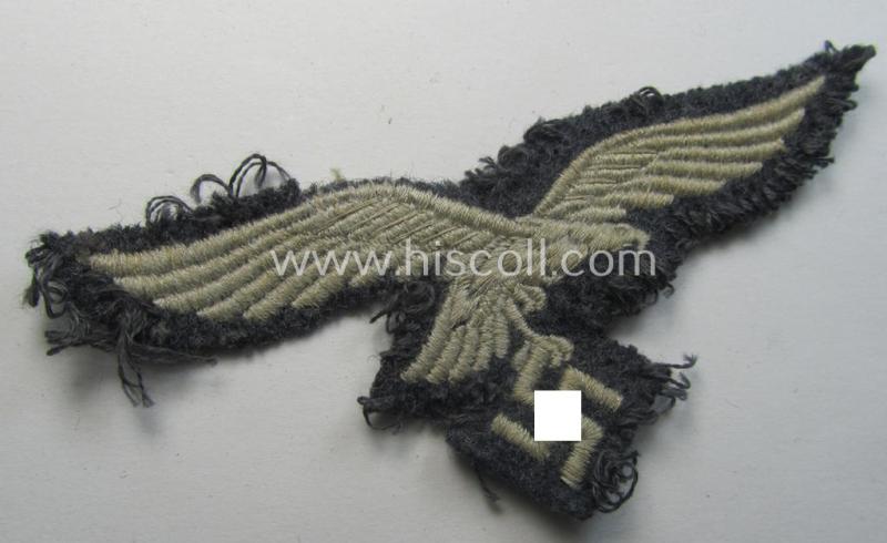 Attractive - and clearly used- ie. carefully tunic-removed! - WH (Luftwaffe) EM- (ie. eventually NCO-) type breasteagle (being a once tunic-attached example as executed in typical machine-embroidered-pattern)