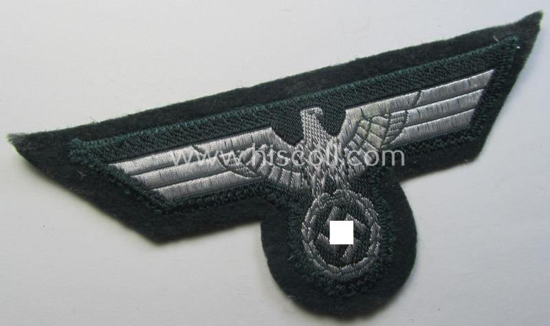 WH (Heeres) breast-eagle as executed in 'BeVo'-type-, so-called: 'flat-wire'-weave-pattern and pre-mounted on darker-green-coloured wool as was specifically intended for usage by soldiers (ie. NCOs) on their dress-tunics (ie. 'Waffenröcke')