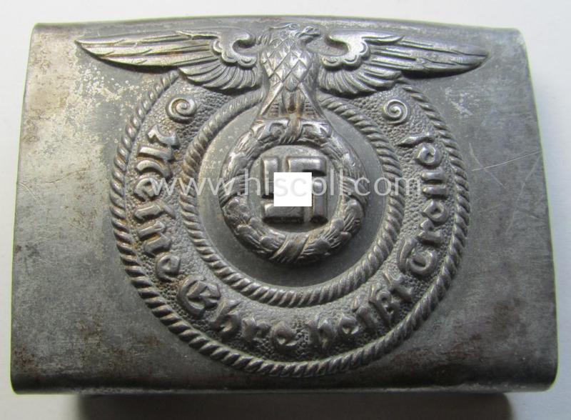 Waffen-SS enlisted-mens'- (ie. NCO-) type belt-buckle (being a typical, unmarked and/or typical steel-based: 'Overhoff & Cie'-example) that comes in a surely issued- and/or moderately used- ie. worn-, condition