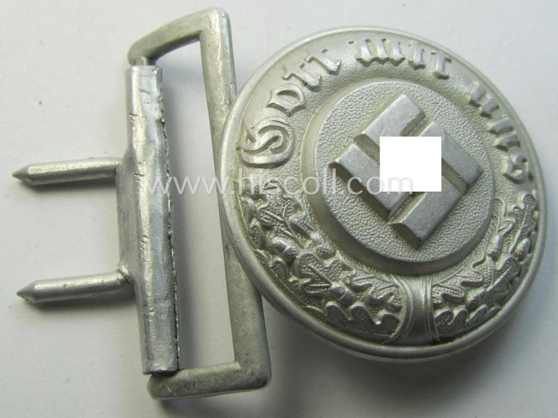 Attractive, police- (ie. 'SS-Polizei') aluminium-based, officers'-pattern belt-buckle (ie. 'Koppelschloss für Offiziere der SS, Polizei o. Gendarmerie') being a maker- (ie. 'OLC'-) marked example that comes in a minimally used- ie. worn, condition