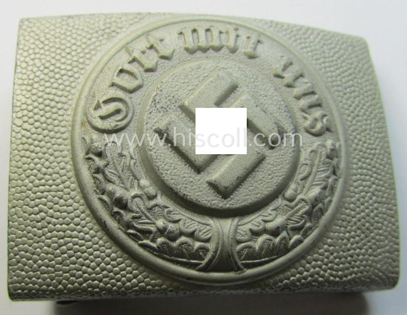 Attractive, police (ie. 'Polizei') 'standard'-pattern, steel-based belt-buckle (ie. 'Koppelschloss für Manns. u. Uffz. der Polizei') being a neatly maker- (ie. 'OLC'-) marked example that comes in a very nice and/or fully untouched, condition