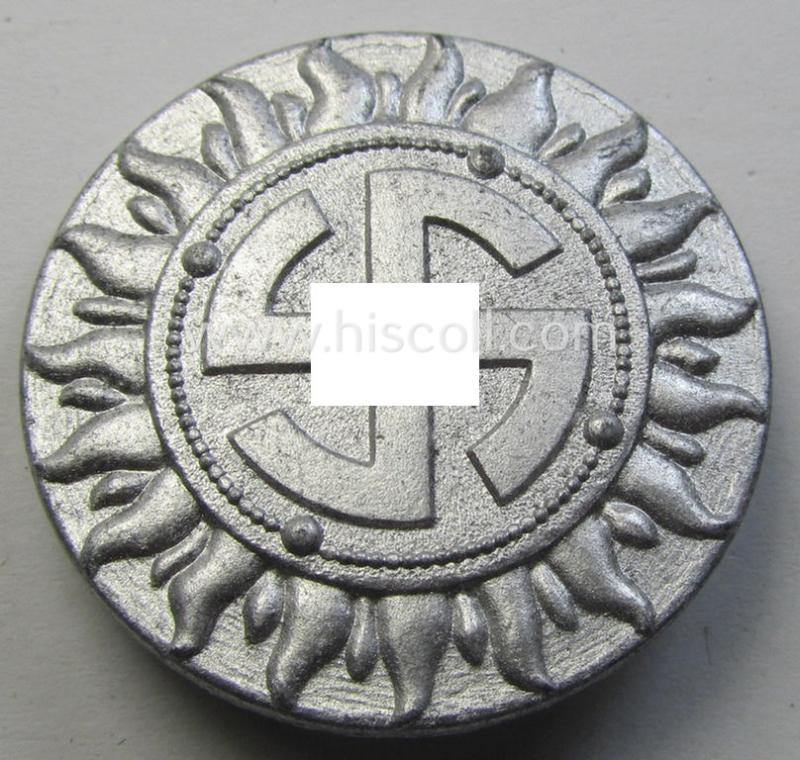 Bright-silver-toned, N.S.D.A.P.-related 'tinnie' (ie. 'Tagungs- o. Veranstaltungsabzeichen') being a neatly-maker- (ie. 'Wilh. Schröder & Co - Lüdenscheid') marked example showing a (typical) rounded swastika surrounded by a sunburst