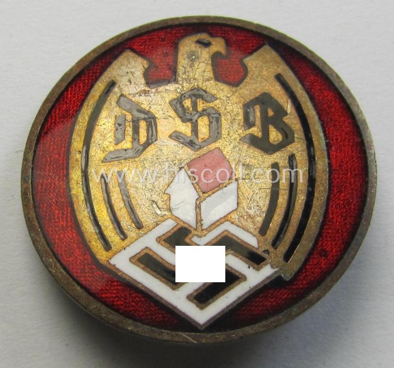 Bright-red-enamelled membership-badge (ie. 'Mitgliedsabz.') as was intended for usage by a member within the: 'Deutscher Siedlerbund' (ie. 'DSB') being a piece that shows a makers'- (ie. 'HA'-) and/or 'Ges.Gesch.'-patent-pending-designation