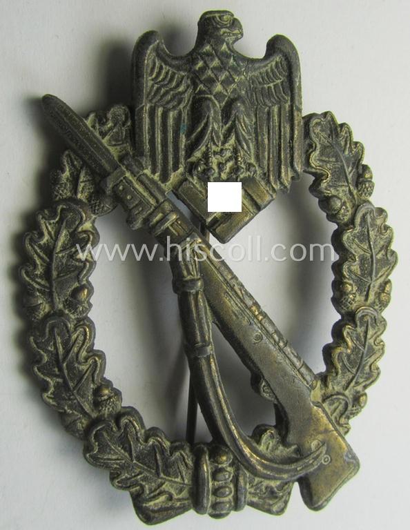 Neat - albeit moderately worn! - 'Infanterie Sturmabzeichen in Bronze' being a maker- (ie. 'MK' in a triangle-) marked (and/or minimally converse- ie. vaulted-) example by a to date still unidentified maker as was executed in golden-bronze-toned, zinc